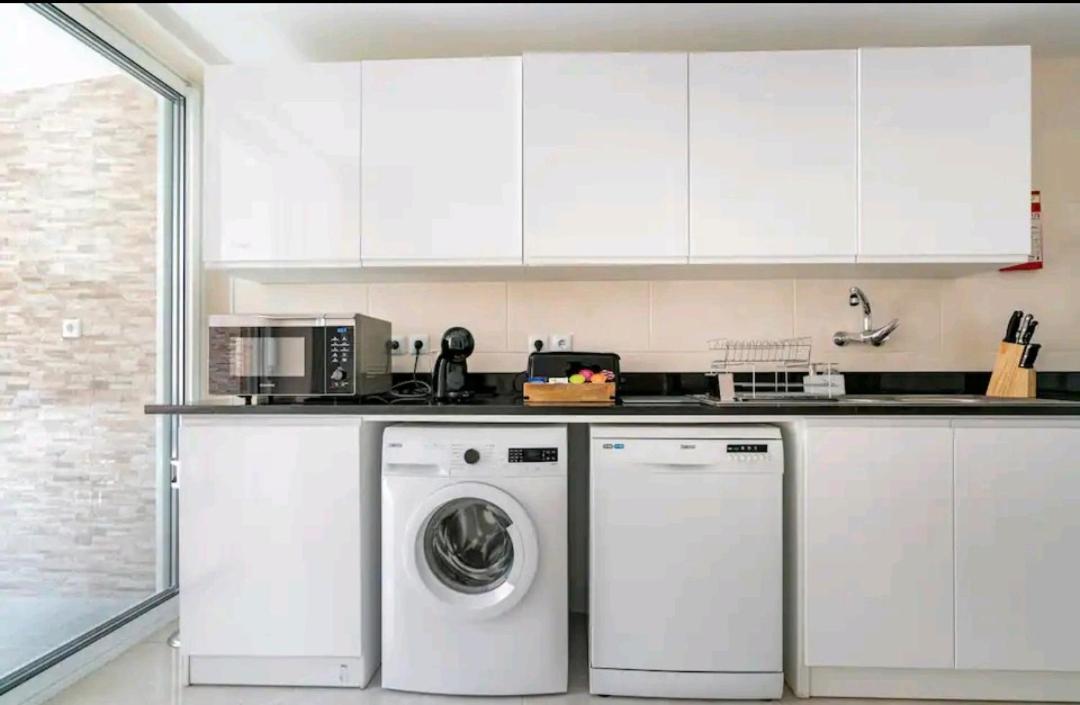 Marina Holiday House Quarteira Bagian luar foto